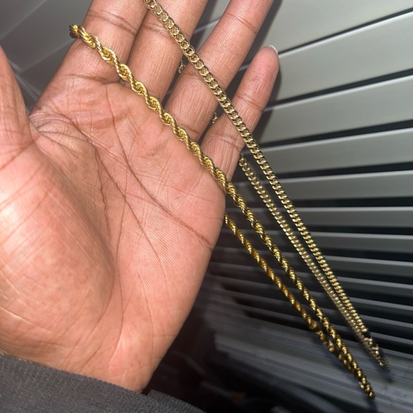 Two golden chains, both 11.5in long. One rope style and one...